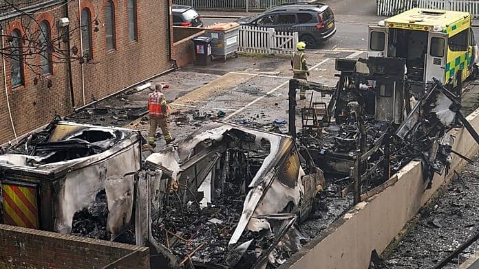 Four men face charges over arson attack on ambulances in London Four men face charges over arson attack on ambulances in London