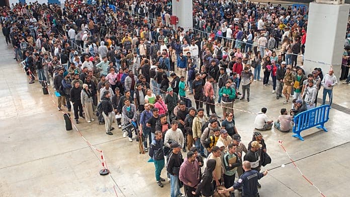 Spain grants legal status to 1.2 million undocumented migrants under scheme Spain grants legal status to 1.2 million undocumented migrants under scheme