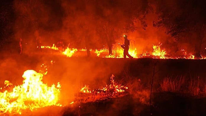 Spain sees progress in wildfire battle despite risks from new heatwave