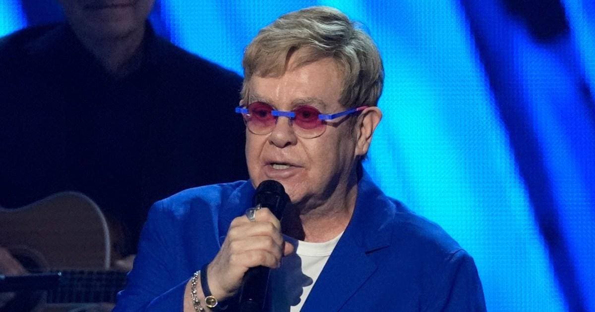 Sir Elton John pays emotional tribute to 'idol' during rare appearance