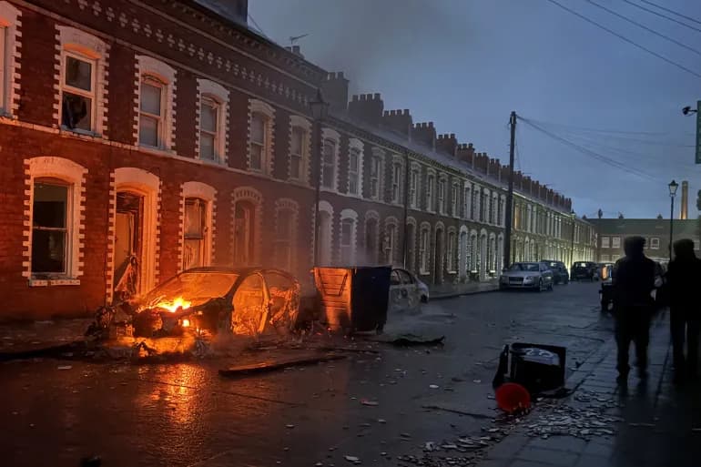 Protesters set fire to vehicles and buildings in Belfast following stabbing incident Protesters set fire to vehicles and buildings in Belfast following stabbing incident