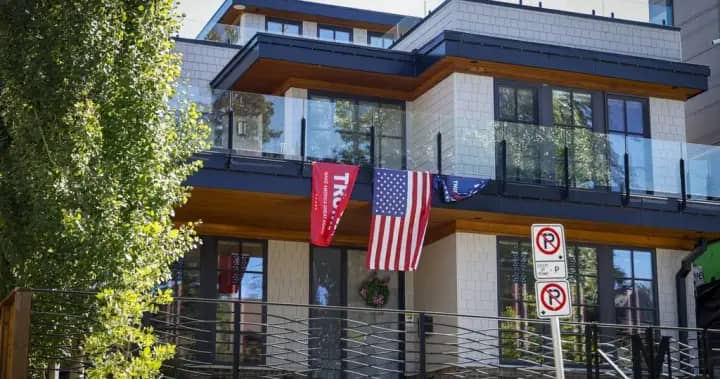 Calgary home displaying pro-Trump flags vandalised during trade tensions