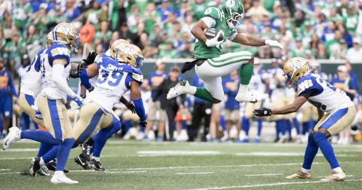 Roughriders win in overtime against Blue Bombers as Stevens scores three TDs